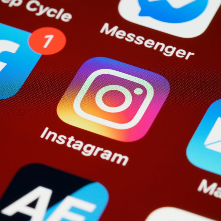 Vibrant close-up of popular social media app icons on a smartphone screen.
